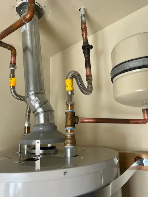 Water heater installation and plumbing repair in Fitch